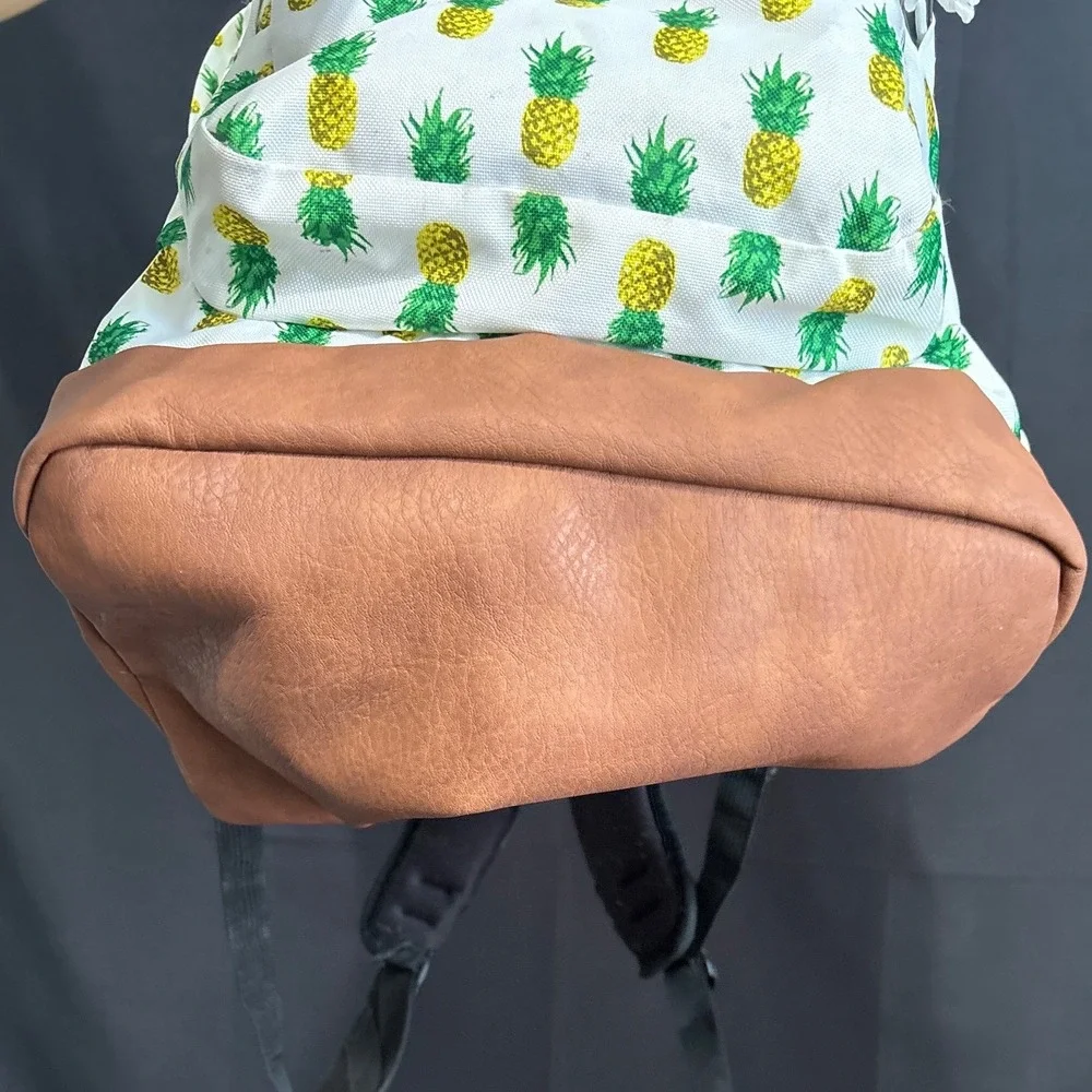 Trans by JanSport Pineapple Print Backpack JS0A33S3 Brown Faux Leather Bottom